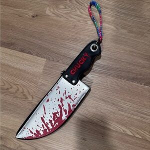 Chucky Themed Clutch with Red and Black Design